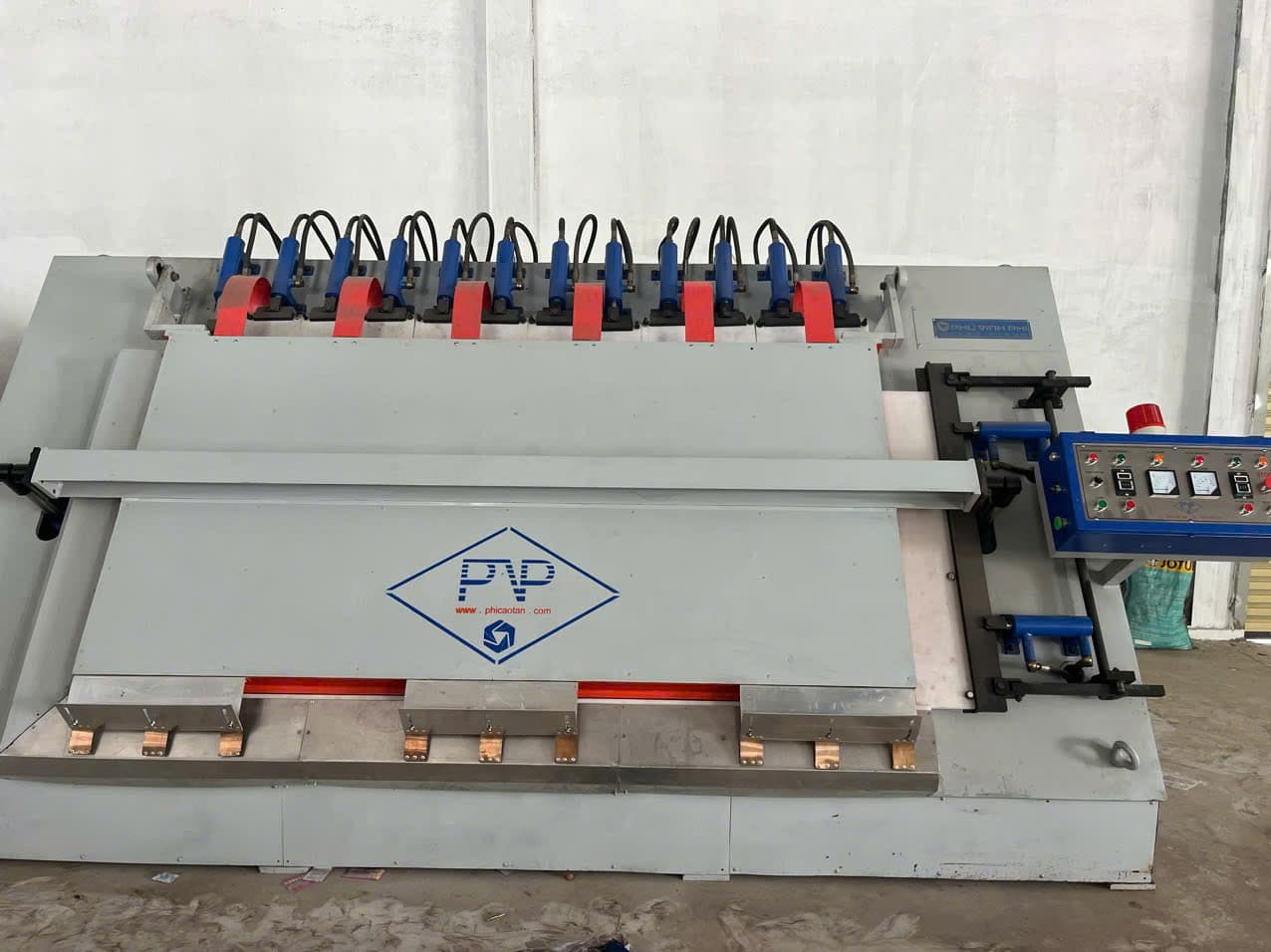 Operator positioning frame before pressing